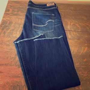Levi”s ankle straight high rise raw hem jeans